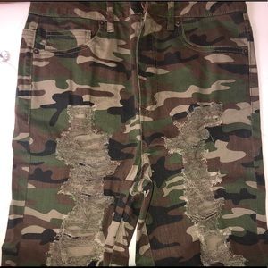 Ripped camo bermuda shorts